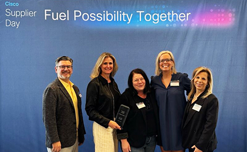 Team holding Cisco Supplier Award with Fuel Possibility Together text